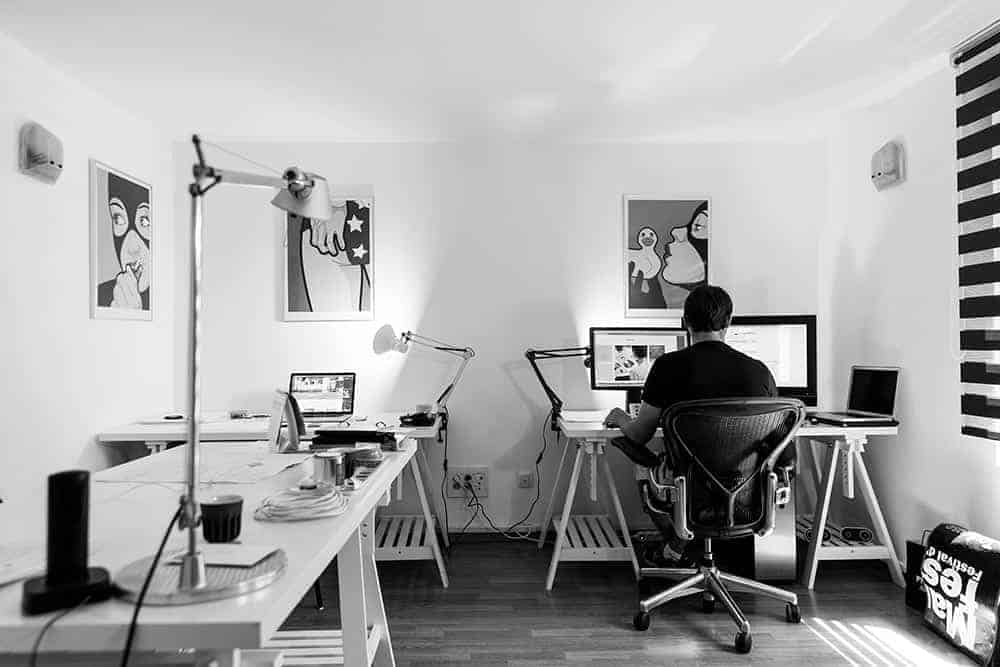 Top benefits of working from home showing a man working from a home office